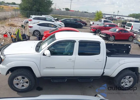 2015 Toyota Tacoma Base V6 z USA, uszkodzony, nr VIN 3TMMU4FN0FM083581